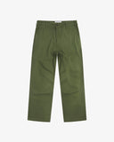 Full-length front view of Uskees twill workwear pants in coriander-green. Showing Corozo button fastening and tapered leg fit.