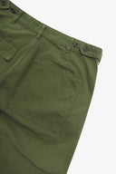Close up back shot of Uskees 5005 twill workwear pants in coriander-green with focus on back pocket, adjustable waistband secured with Corozo button and belt loops.