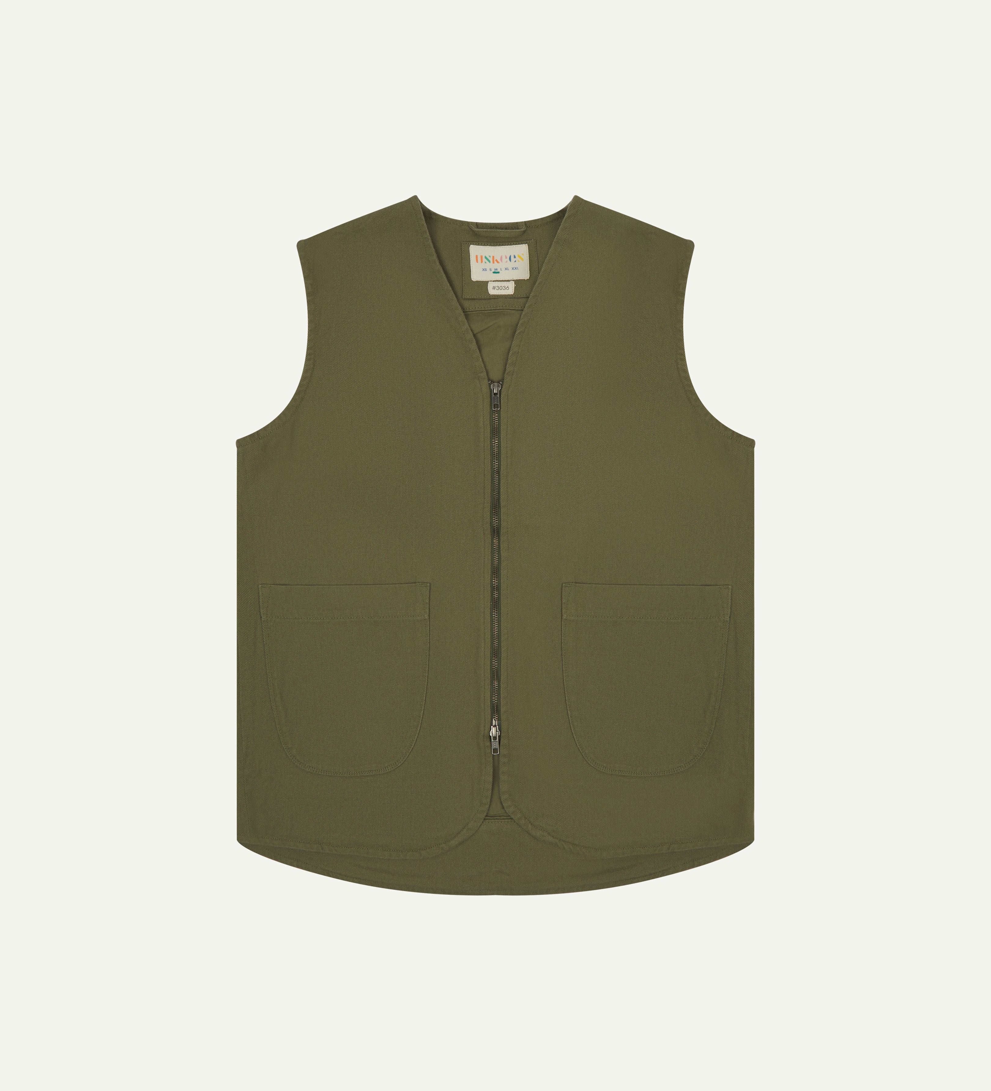 Moss buttoned organic cotton-drill vest from Uskees showing clear view of curved patch pockets and branding label.