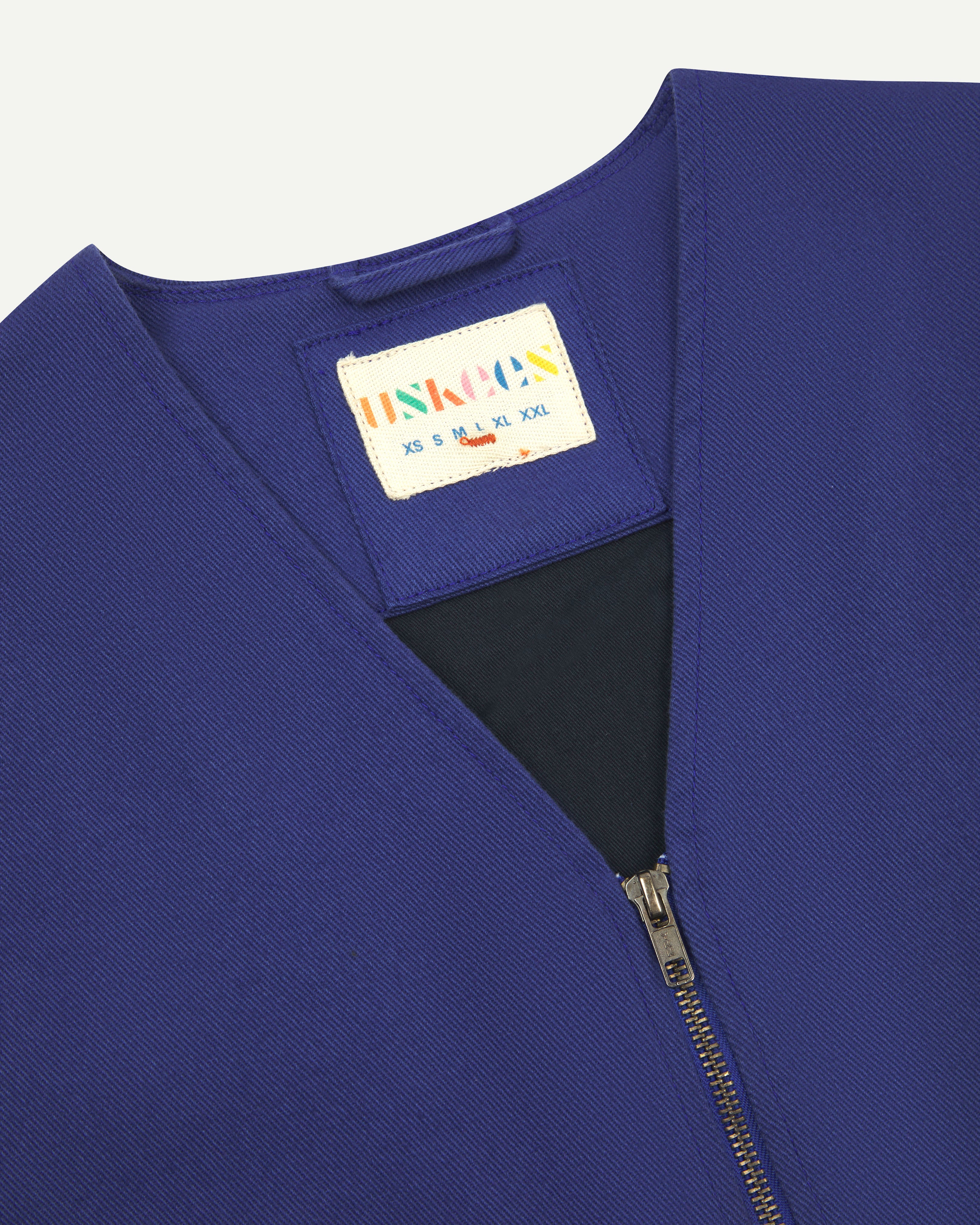 Close up shot of Uskees #3036 Ultra Blue zip front vest