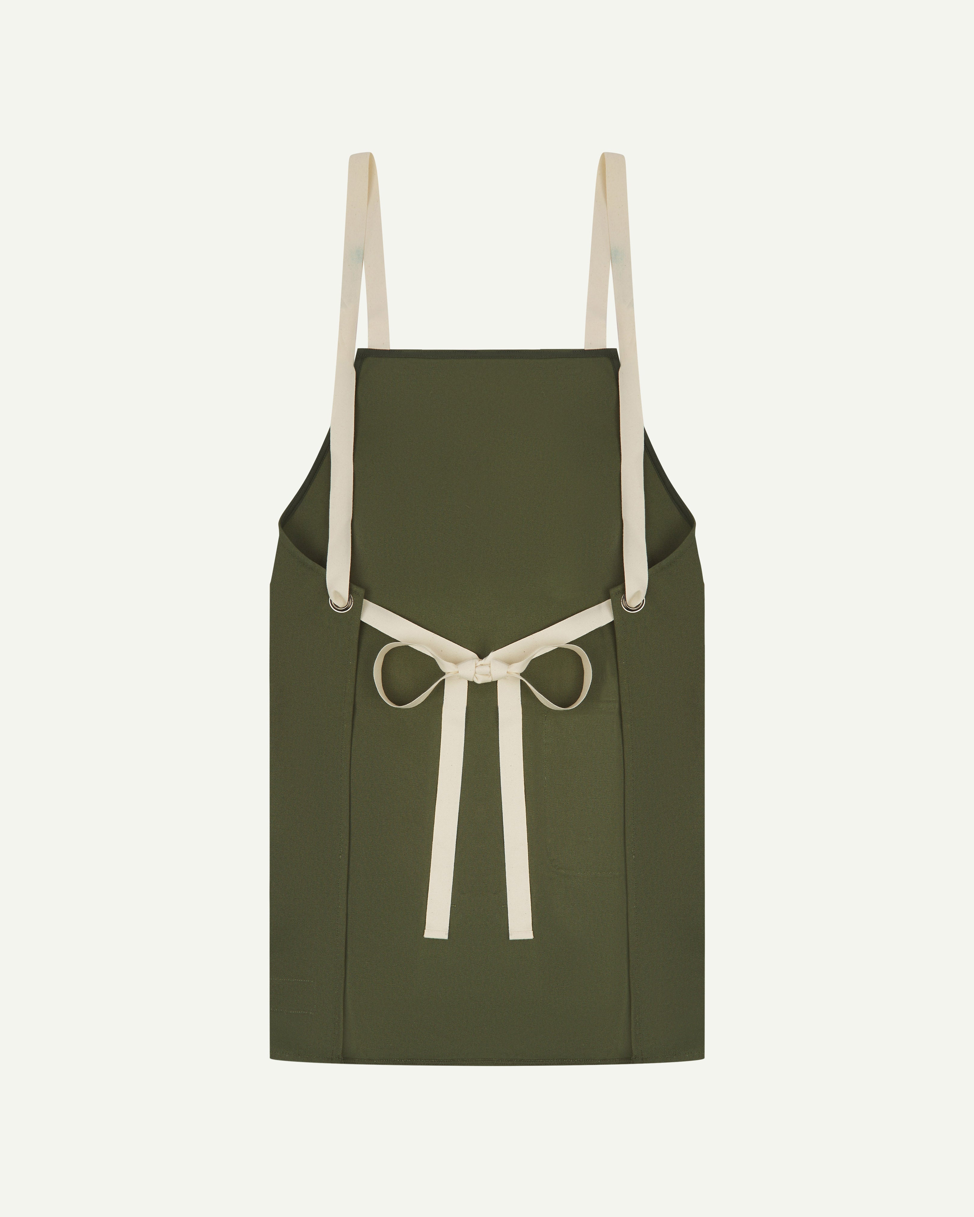 Back flat shot of uskees unisex green canvas apron showing adjustable cream straps 