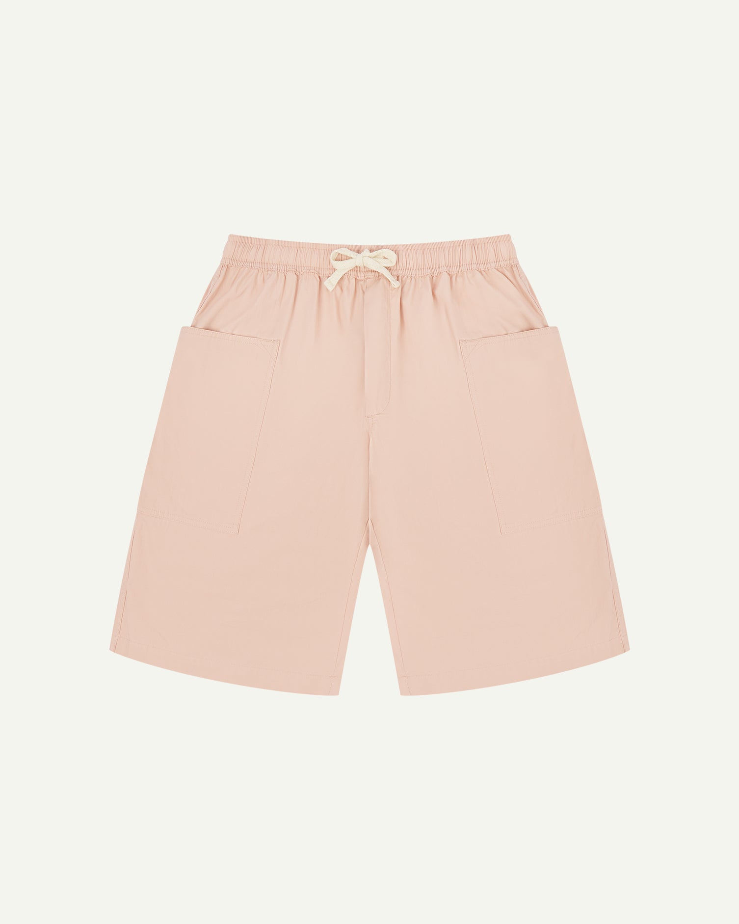 Front view of dusty pink organic cotton #5015 lightweight cotton shorts by Uskees. Clear view of elasticated waist and deep front pockets.
