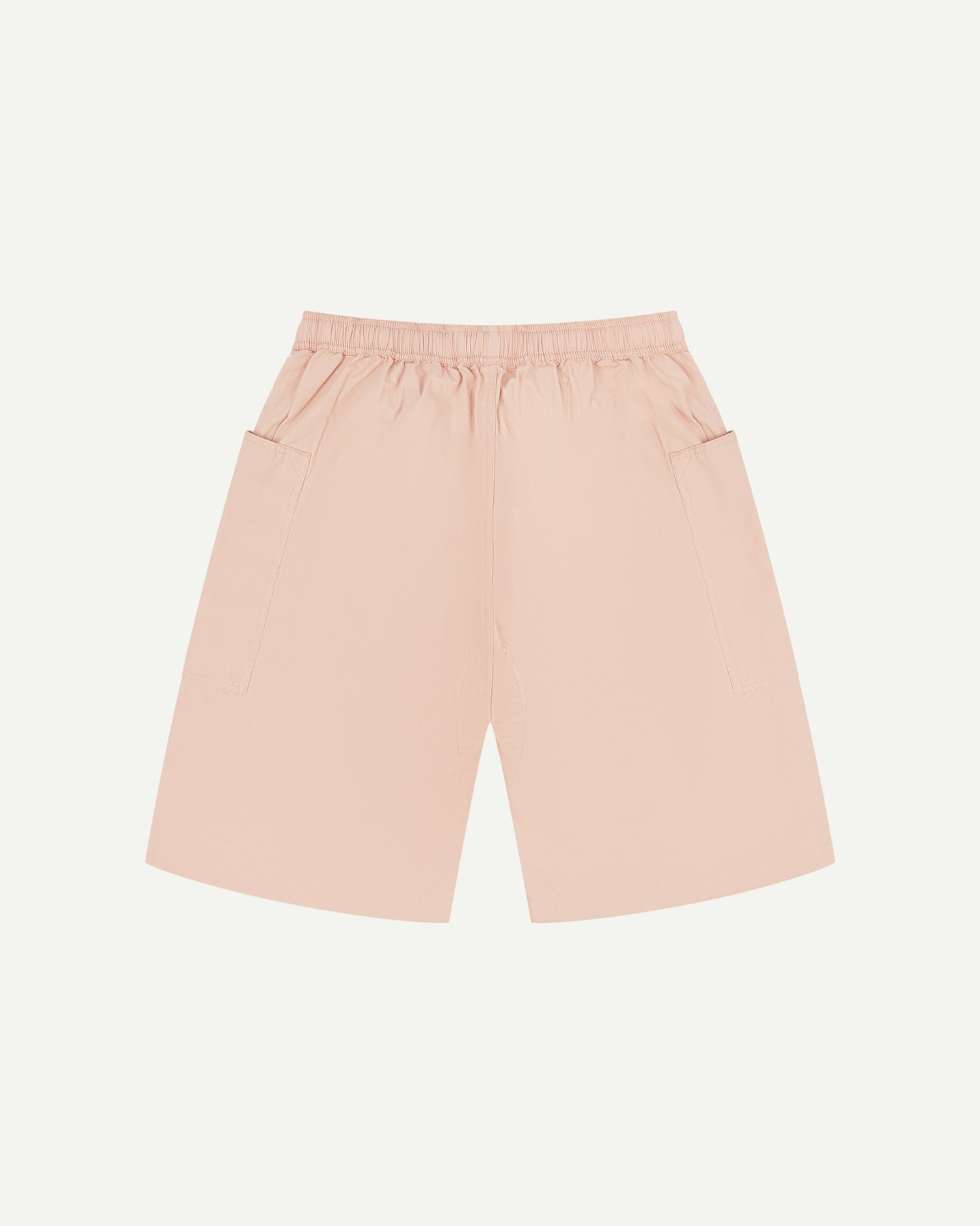 Back view of dusty pink organic cotton #5015 lightweight cotton shorts by Uskees. Clear view of elasticated waist .