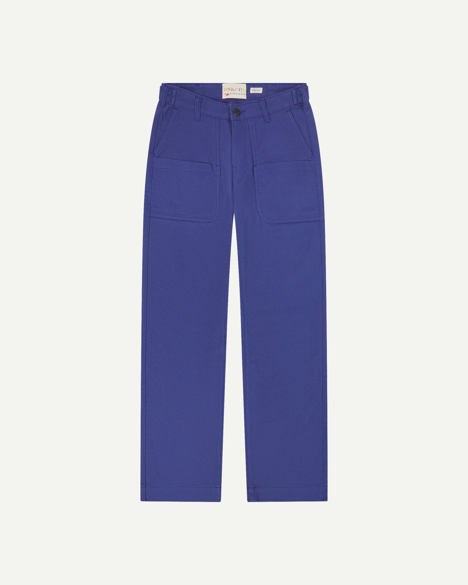 Flat shot of uskees ultra blue drill trousers for men showing label at waistband