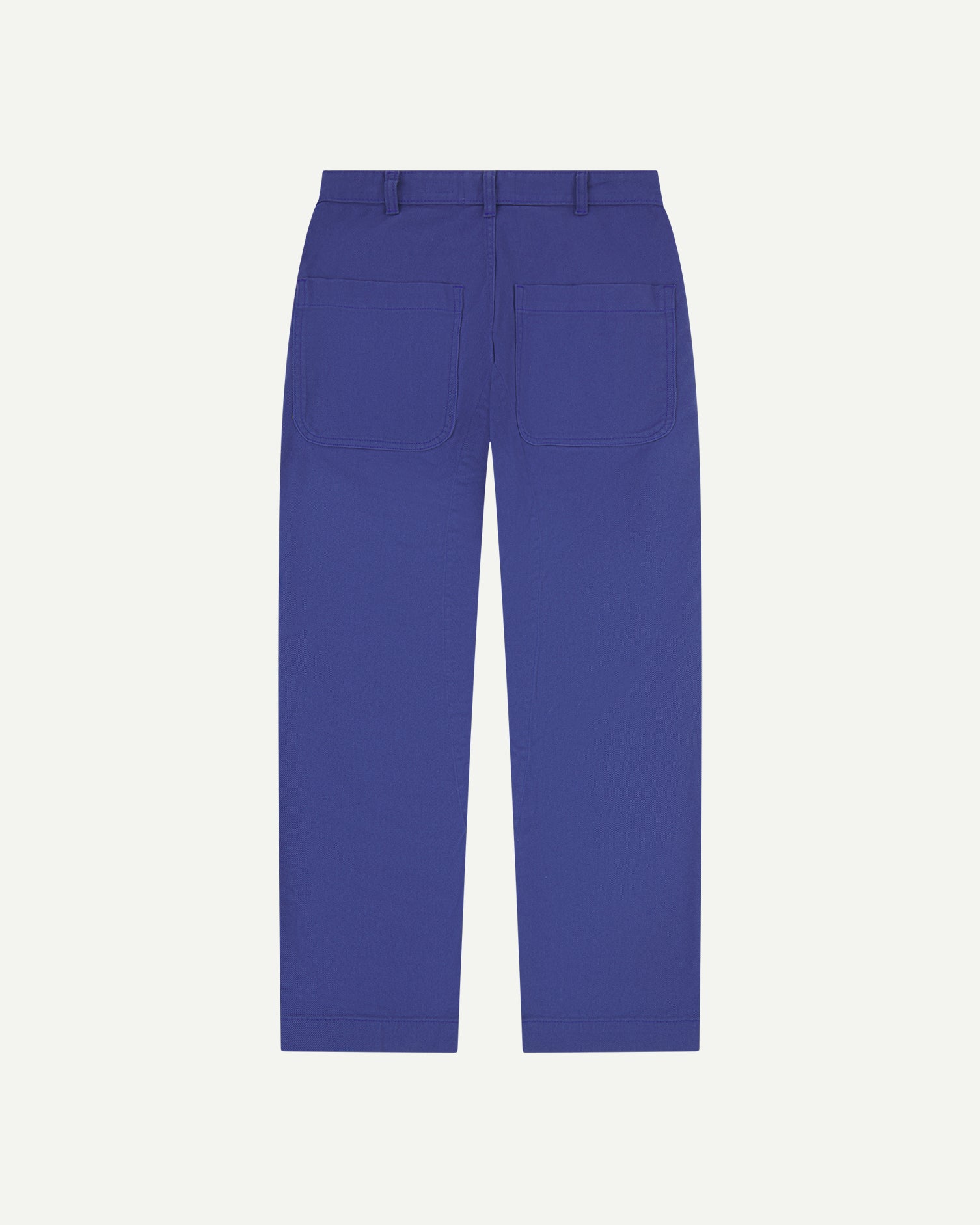 Back view of Uskees cotton drill 'commuter' trousers for men in ultra blue showing back pockets