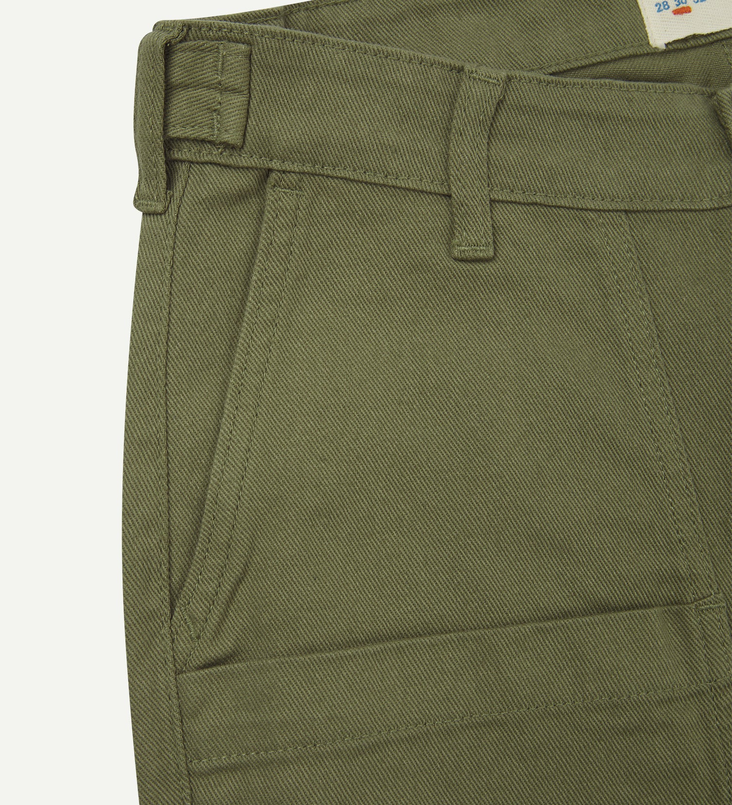 Close up shot of Uskees #5013 drill men's trousers showing pocket and waistband detail