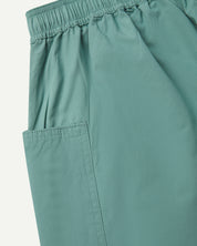 Back view of eucalyptus green organic cotton #5015 lightweight cotton shorts by Uskees. Clear view of elasticated waist