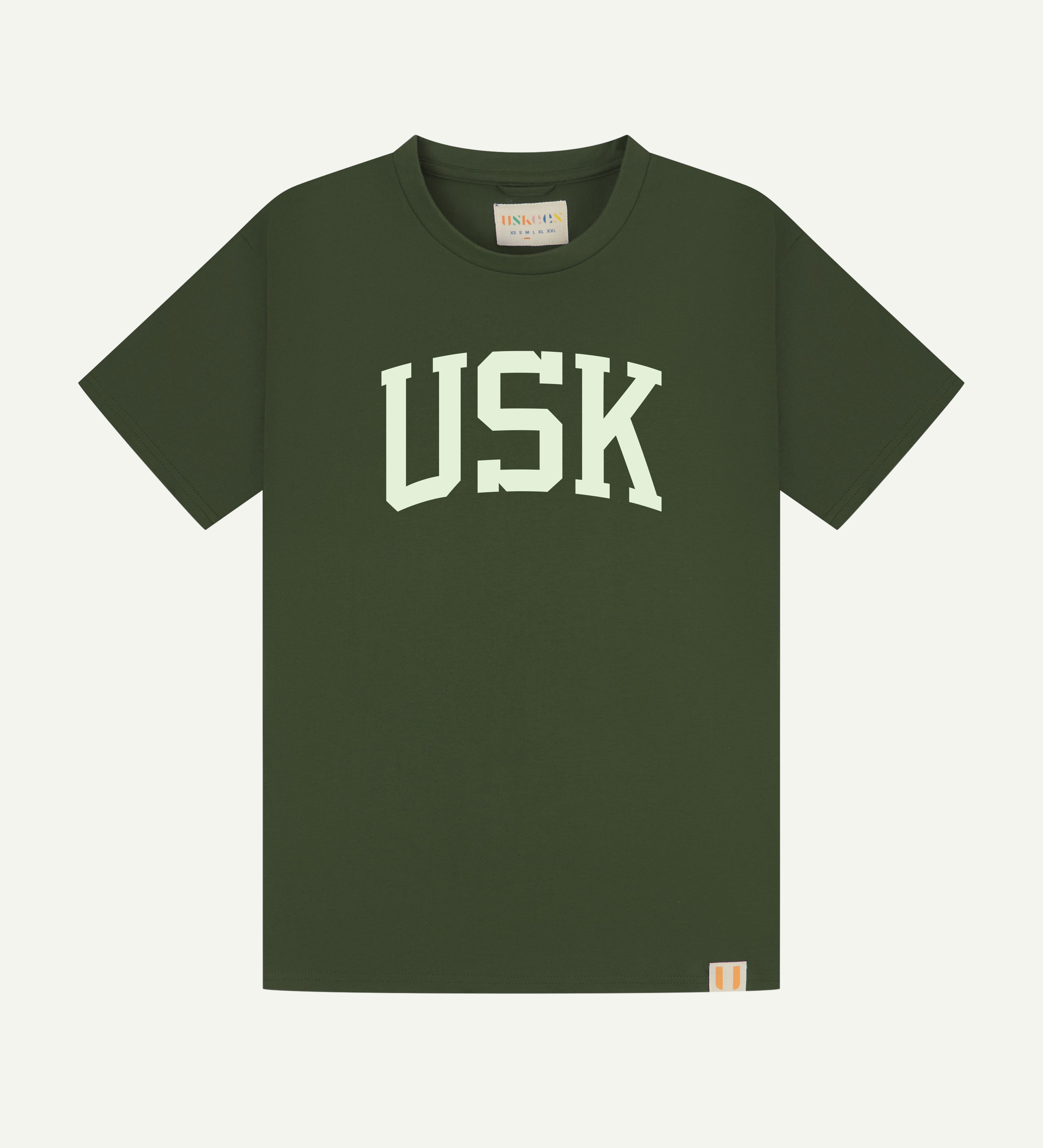 Flat shot of uskees men's signature tee in green with white USK logo on the front.