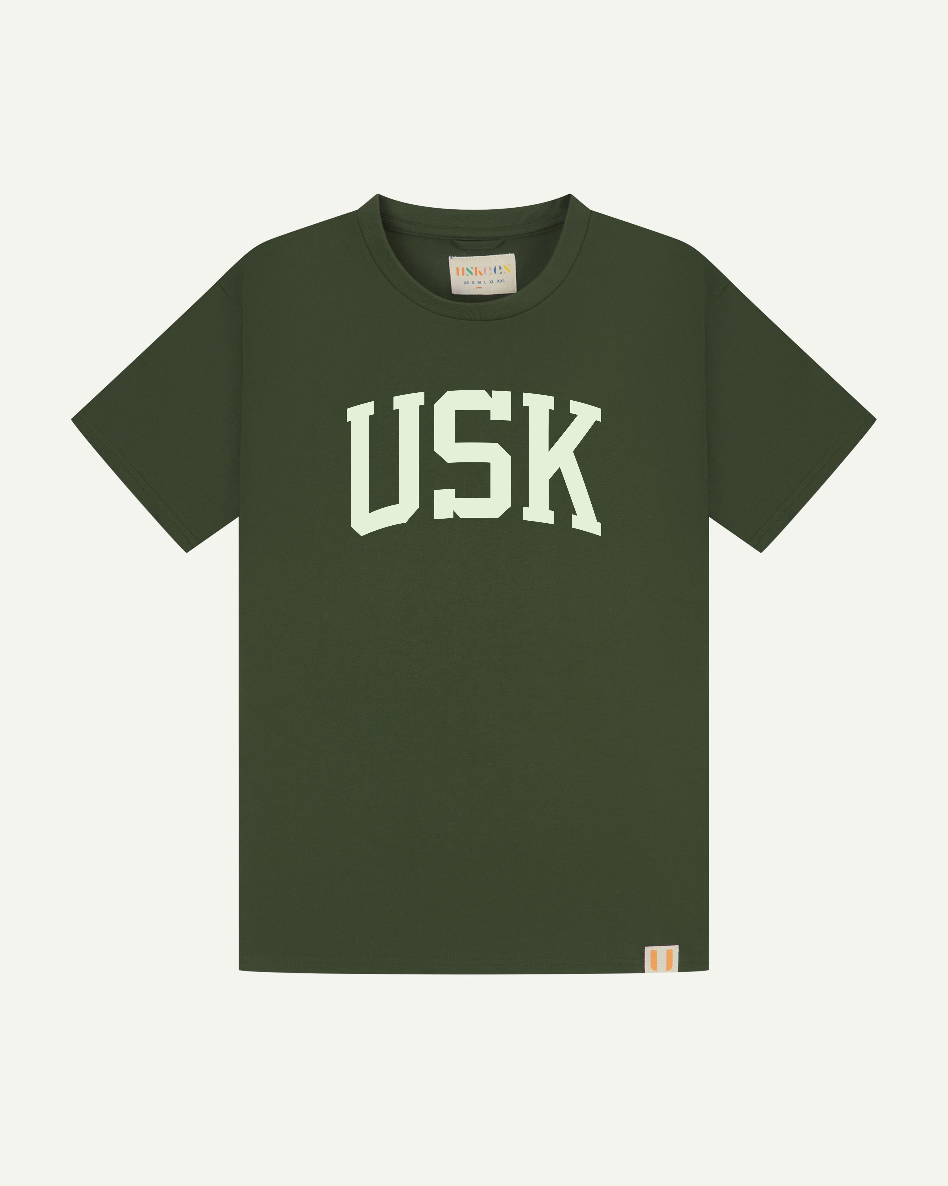 Flat shot of uskees men's signature tee in green with white USK logo on the front.