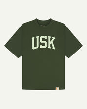 flat front shot of coriander green uskees signature t-shirt showing the cream USK logo.