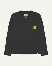 front flat shot of the uskees faded black long sleeved Tee for men showing the yellow USK logo on the chest pocket