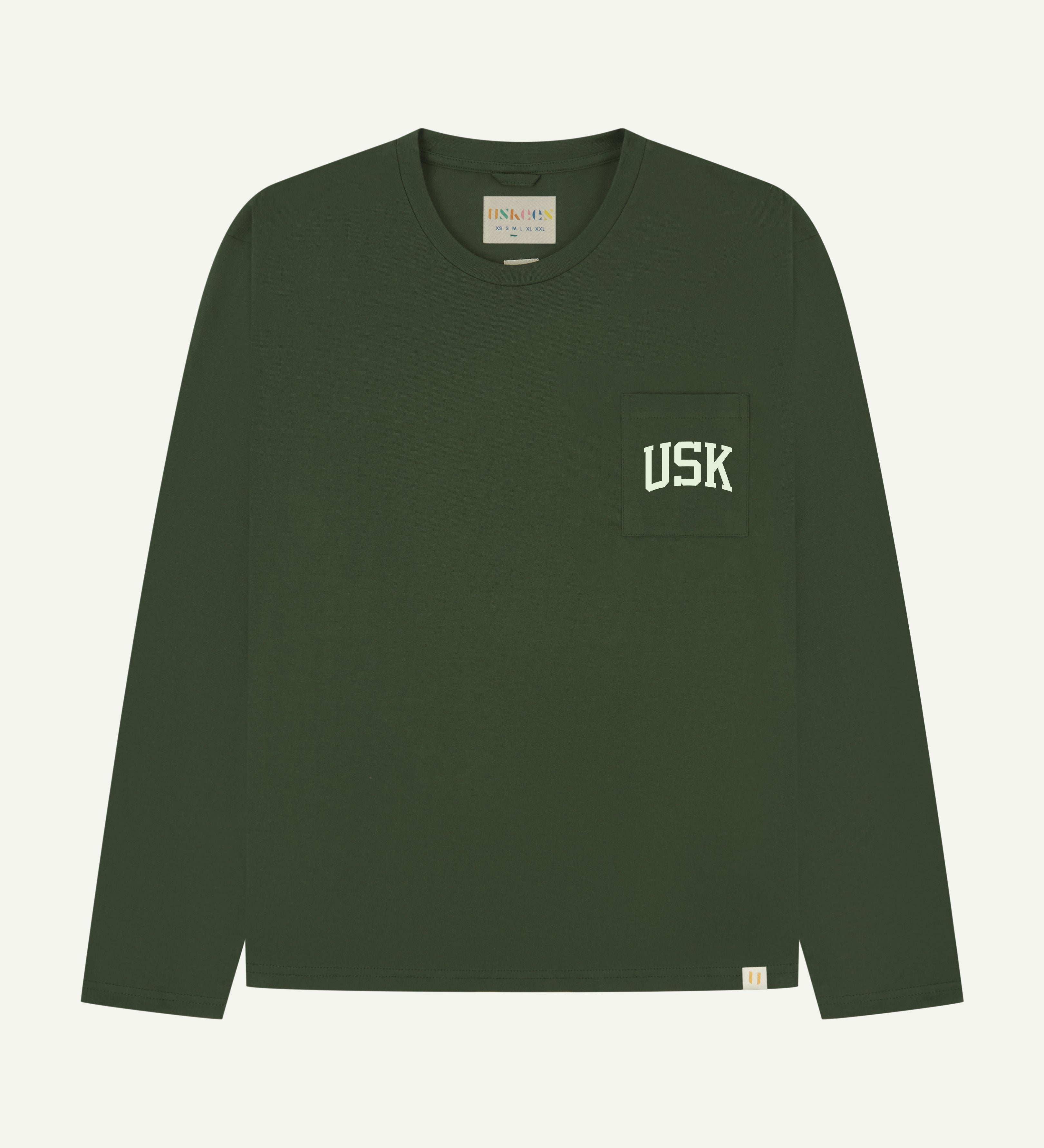 front flat shot of the uskees green long sleeved Tee for men showing the white USK logo on the chest pocket