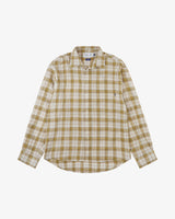 Plaid long-sleeve shirt with a visible Uskees brand logo at neck, presented on a white background