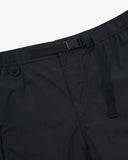 Close up shot of Uskees black trek shorts for men showing the waistband, Presented on a light gray background
