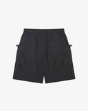 Back flat shot of Uskees black trek shorts for men showing the pockets, Presented on a light gray background