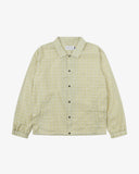 Front flat shot of Uskees pastel yellow check coach jacket for men on a white background.
