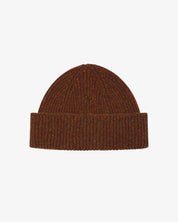 Brown speckled knit beanie on a light coloured background