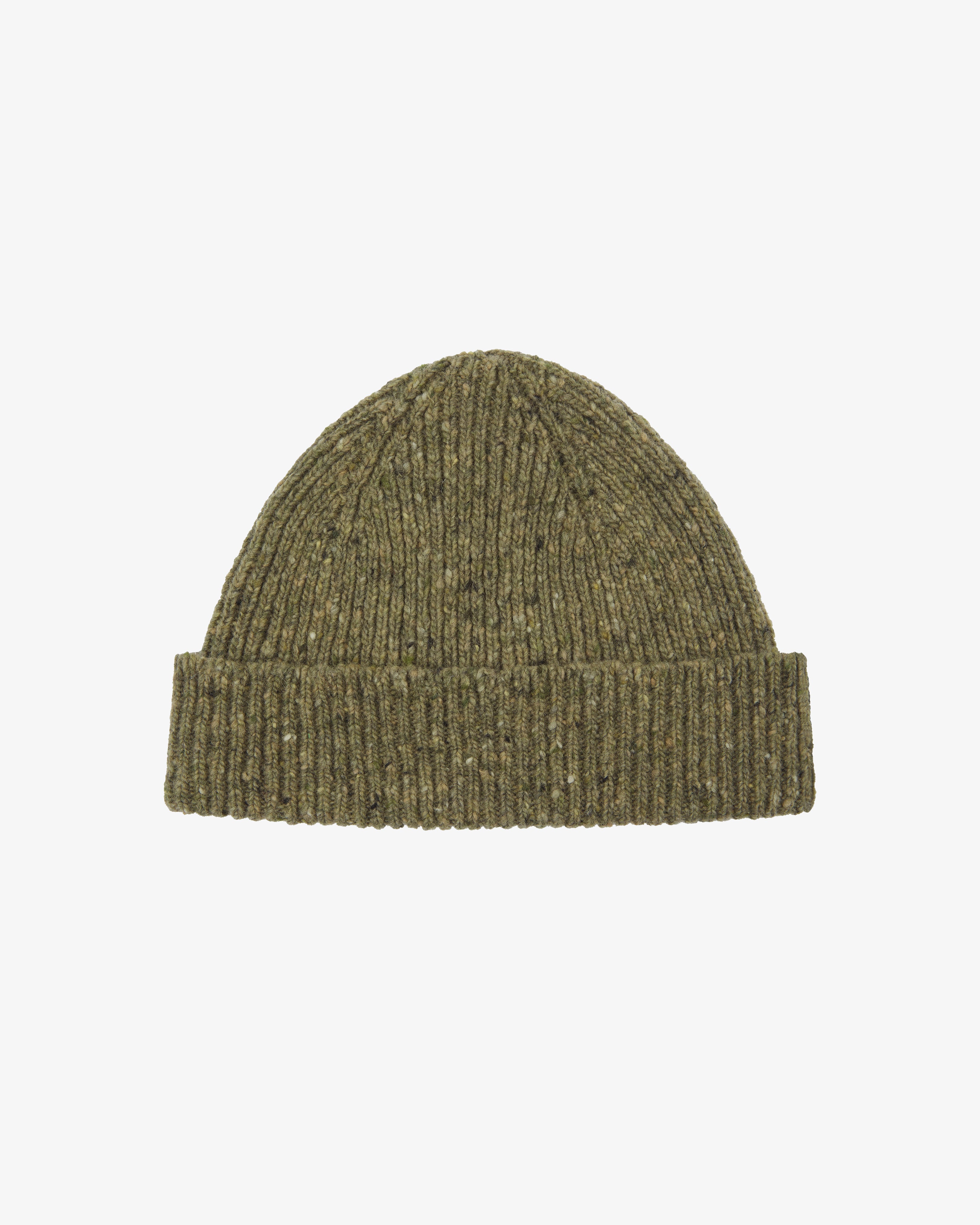 Uskees Herb Green knit beanie on a light gray background