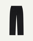 Back view of men's dark blue corduroy pants laid flat on a white background