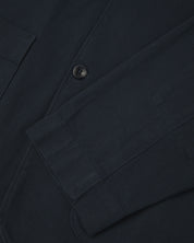 close-up view of uskees men's blueberry drill blazer showing cuff and button detail.
