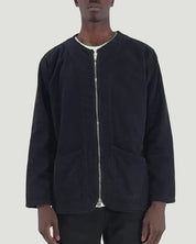 Fitting guide demonstration for the Uskees #3030 corduroy zip jacket in midnight blue