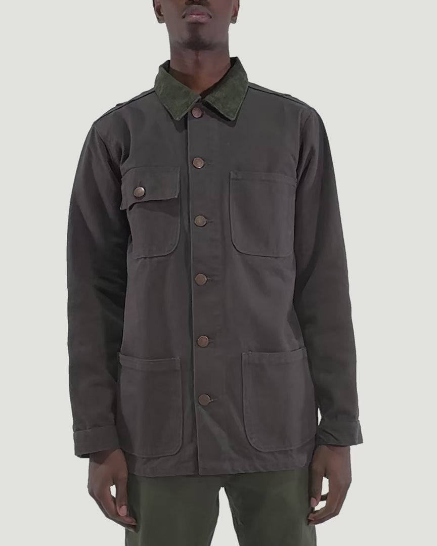 Fitting guide demonstration for the Uskees #3025 canvas chore jacket in charcoal.