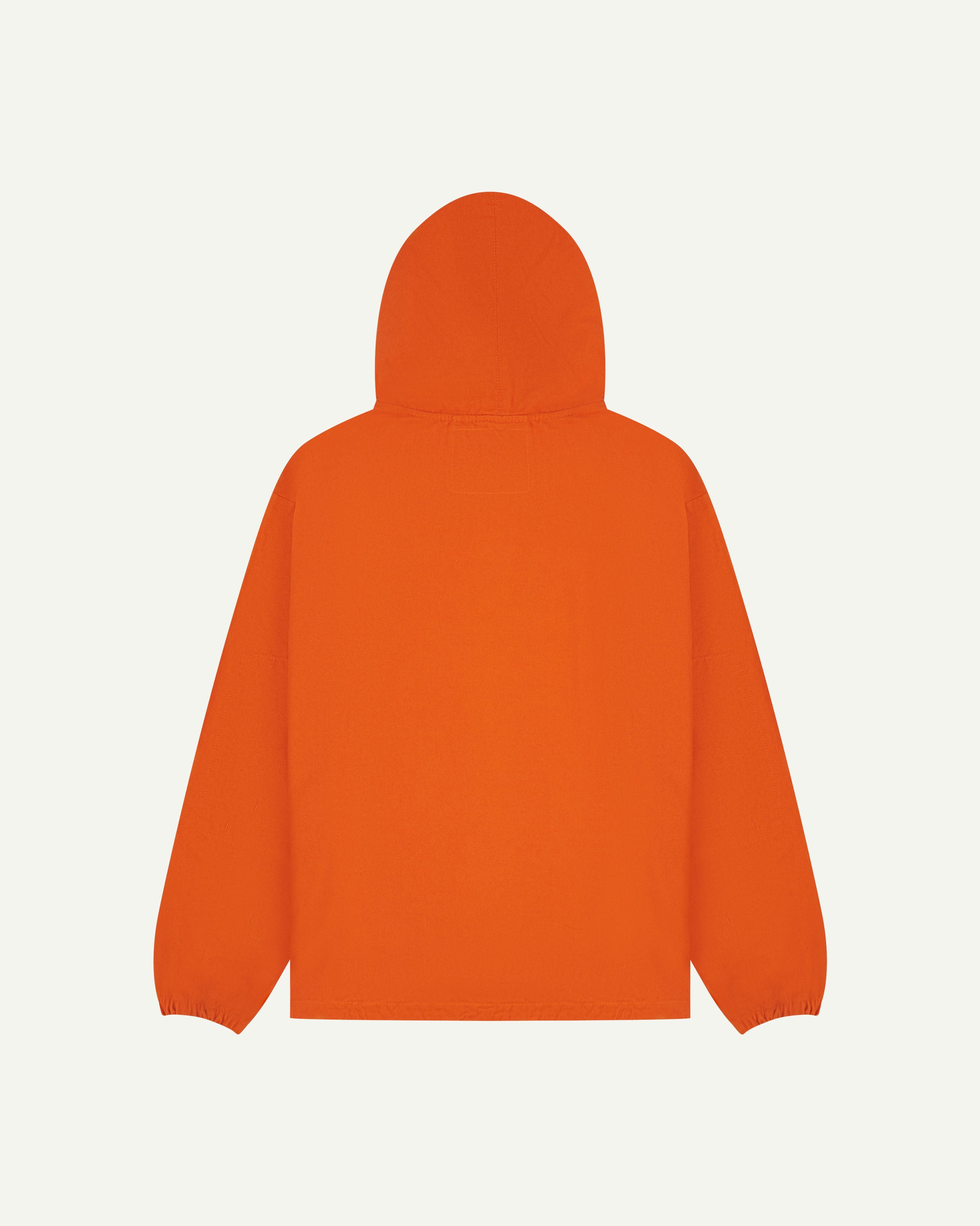 Flat back view of orange coloured men's smock from Uskees