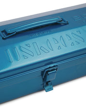 Close-up view of blue Toyo steel toolbox with focus on Uskees branding, camber-top and rounded handle.