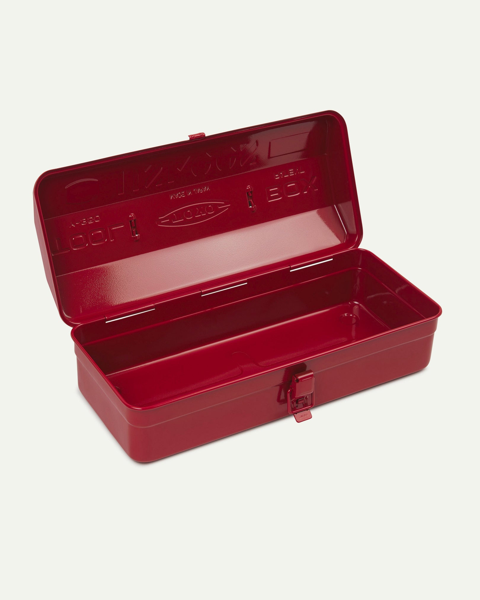 Angled view of red Toyo steel toolbox from Uskees with open lid showing the inside.