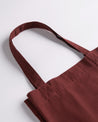 Close-up view of Uskees #4002 small tote bag in merlot-red with focus on the robust, twin carry handles.
